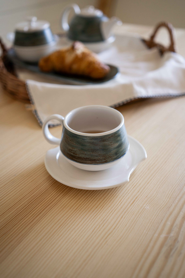 Керамічна чашка з блюдцем Melange 